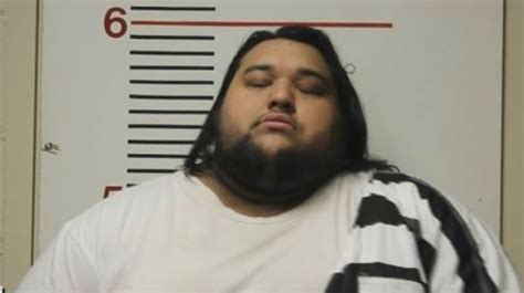 Alleged mastermind behind immigrant truck tragedy that killed 53 .